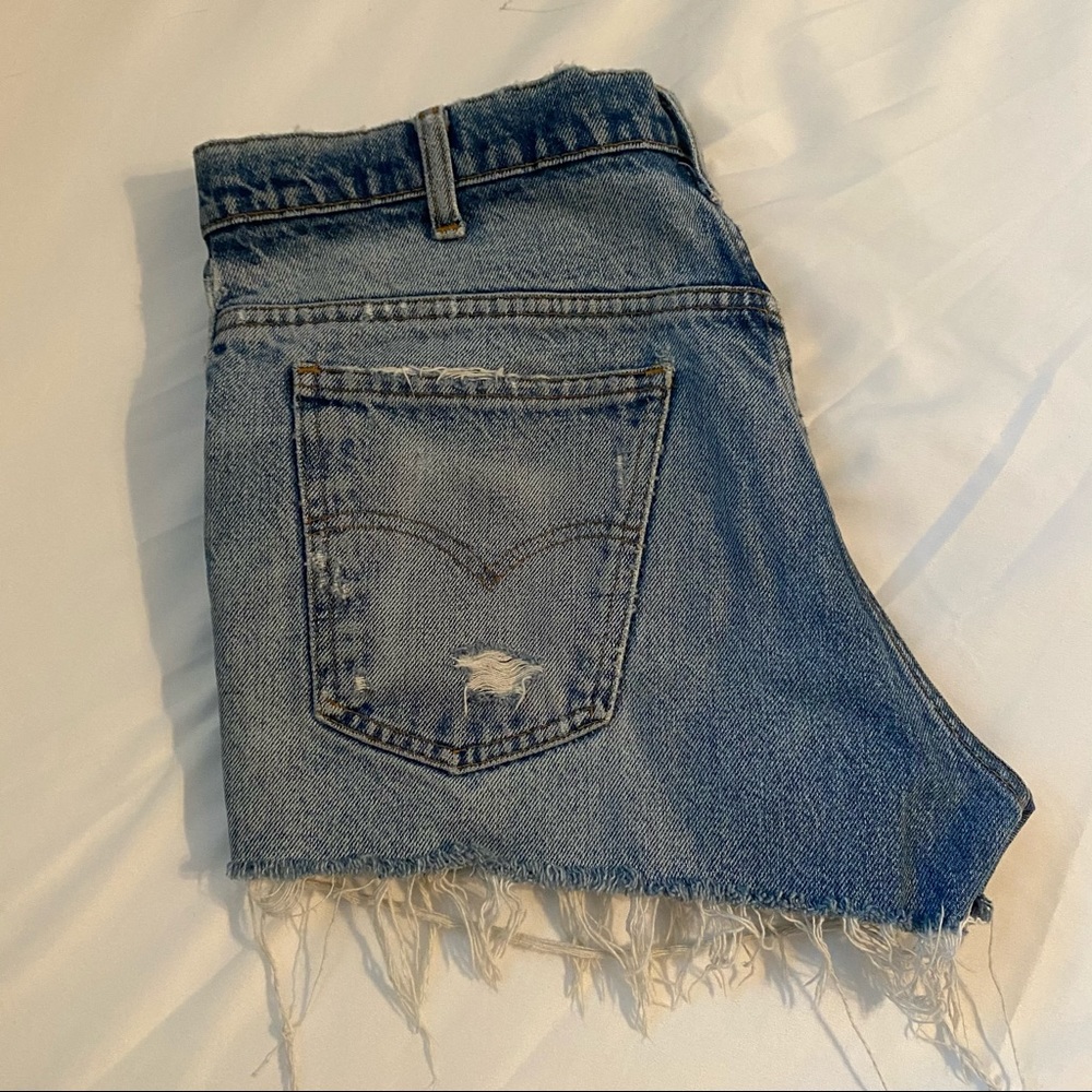 Mid-wash, Reworked Levi’s cut-offs - Picture 2 of 3